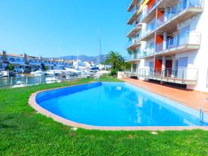 Bazén v ubytovaní GMID IMMO A222 Gregal Piso 2 habitaciones, parking y piscina alebo v jeho blízkosti