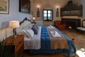 Cama o camas de una habitación en Castello Costaguti