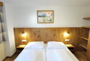 Postel nebo postele na pokoji v ubytování Gästehaus Scherl