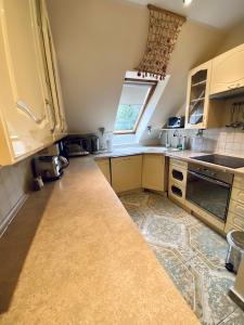 Kuchyňa alebo kuchynka v ubytovaní Apartament Michel Marine + 10 fotografií