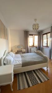 Giường trong phòng chung tại Wakacyjny Apartament blisko plaży.