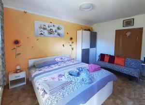 Katil atau katil-katil dalam bilik di Hiša Planica