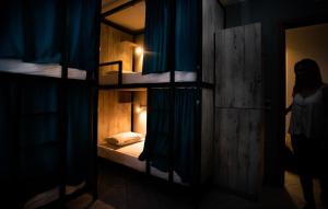 A bed or beds in a room at Bedway Athens Hostel