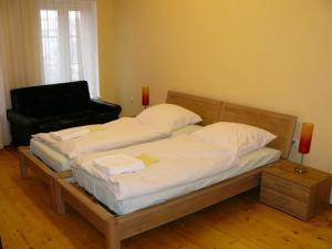 Posteľ alebo postele v izbe v ubytovaní Simon-Dach-Haus