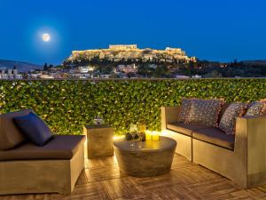 Ein Sitzbereich in der Unterkunft Acropolis City Life BH