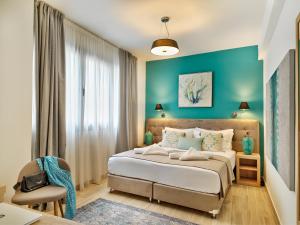 Ein Bett oder Betten in einem Zimmer der Unterkunft Acropolis City Life BH