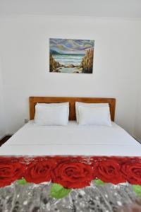 Postel nebo postele na pokoji v ubytování Vila si Casa Kara