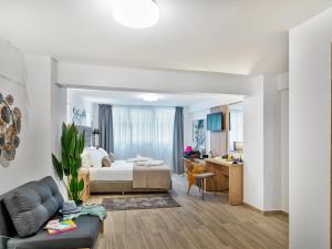 Ein Bett oder Betten in einem Zimmer der Unterkunft Acropolis City Life BH