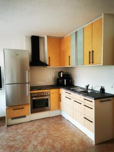 Kuchyň nebo kuchyňský kout v ubytování Haus Knoll
