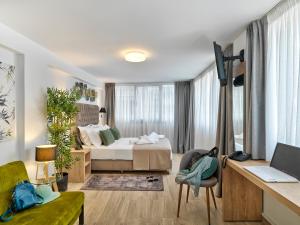 Ein Bett oder Betten in einem Zimmer der Unterkunft Acropolis City Life BH