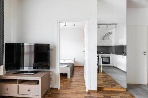 Kuchyňa alebo kuchynka v ubytovaní Wagonowa P&O Apartments