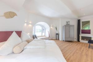 Postel nebo postele na pokoji v ubytování Husumer Wasserturm - Fewo 2