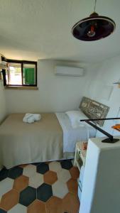 Voodi või voodid majutusasutuse Mini Suite (without kitchen) - Casa Vacanze De Vita - Amazing view on the coast toas