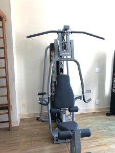 a gym with a exercise bike in a room at San Raphael Hotel in Sao Paulo