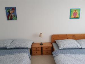 Postel nebo postele na pokoji v ubytování U Koupaliště