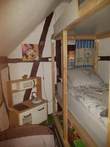 Postel nebo postele na pokoji v ubytování Ferienwohnung Kunterbunt