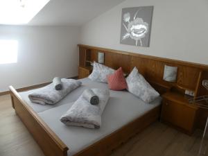 מיטה או מיטות בחדר ב-Apartment Fischer