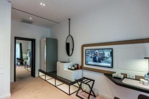 TV a/nebo společenská místnost v ubytování Ivy Garden Hotel Baku