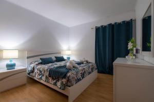 En eller flere senge i et værelse på Happy Home