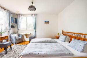 Postel nebo postele na pokoji v ubytování Suite Wellness Azul + 29 fotografií