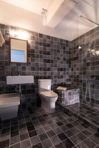 Ванная комната в Vassiliki Residence Skyros Island