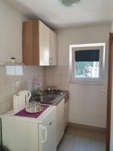 Kuchyňa alebo kuchynka v ubytovaní NaLa apartments