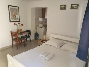 Posteľ alebo postele v izbe v ubytovaní NaLa apartments