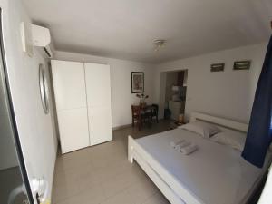 Posteľ alebo postele v izbe v ubytovaní NaLa apartments