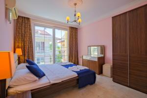 Postel nebo postele na pokoji v ubytování YAS Çalış Beach Villa