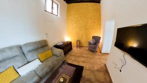A seating area at Apartamento Santa Leocadia