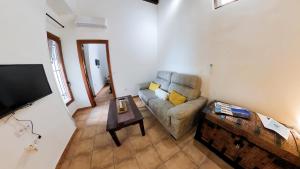 A television and/or entertainment centre at Apartamento Santa Leocadia