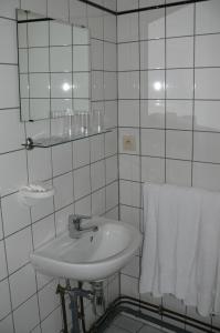 Koupelna v ubytování Hôtel Les Acteurs