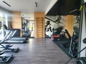 Posilňovňa alebo fitness centrum v ubytovaní Kwadrat Hallera