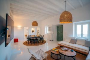 a living room with a couch and a table at Villa Apollonia in Apollonia