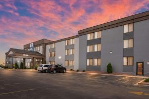 a rendering of a building with a parking lot at Best Western Waukesha Grand in Pewaukee