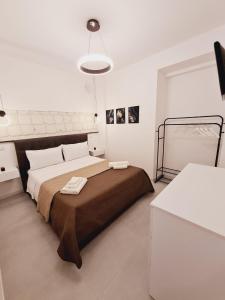 Posteľ alebo postele v izbe v ubytovaní SaNa Apartment