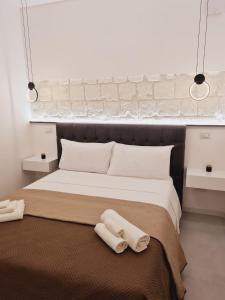 Posteľ alebo postele v izbe v ubytovaní SaNa Apartment