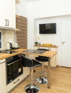 Kuchyň nebo kuchyňský kout v ubytování Modern studio Chiou