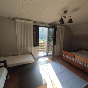 Postel nebo postele na pokoji v ubytování Drinski pogled