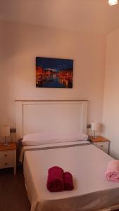 Posteľ alebo postele v izbe v ubytovaní Merlo's Gaviotas. (Apartamento).