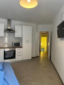 Kuchyňa alebo kuchynka v ubytovaní T2 climatisé st victor Vieux Port et Plage des catalans 13007