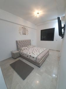 Llit o llits en una habitació de Deluxe Apartment in Marrakesh. hevernage flat