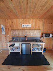 Kuchyň nebo kuchyňský kout v ubytování 7 Olas lodge