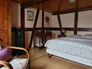 Voodi või voodid majutusasutuse Cosy holiday home in Schleithal with garden toas