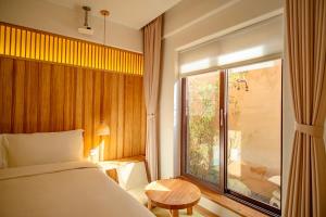 Ένα ή περισσότερα κρεβάτια σε δωμάτιο στο Hantang Inn Hostel Xi'an
