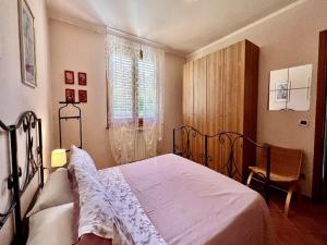 Postel nebo postele na pokoji v ubytování Villa in Tuscany with Private Pool & Views