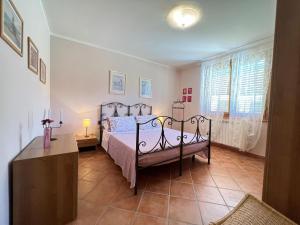 Postel nebo postele na pokoji v ubytování Villa in Tuscany with Private Pool & Views