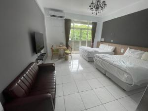 春旅店民宿 Spring Hall B&B房間的床
