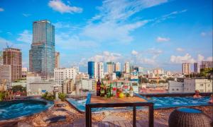 a view of the city from the rooftop of a building at Cochin Zen Hotel in Ho Chi Minh City