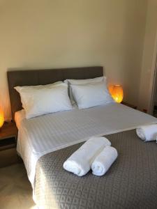 A bed or beds in a room at Venetia apartment